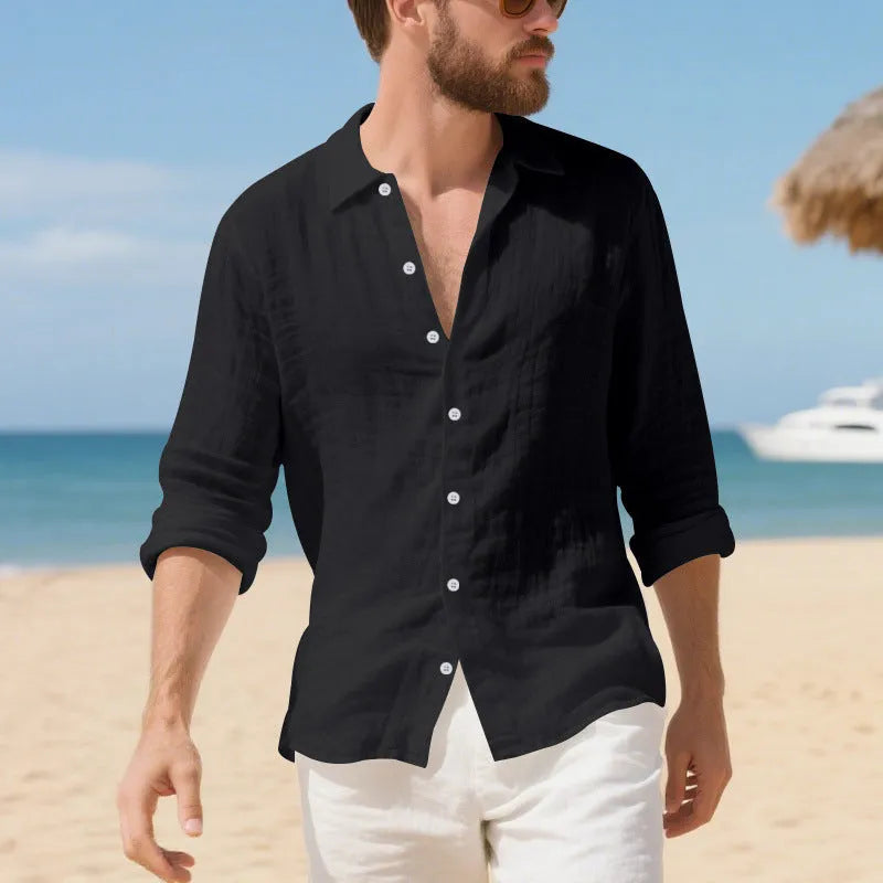 Men's loose fit linen Hawaiian casual shirt on a hanger, shown in light blue colour.