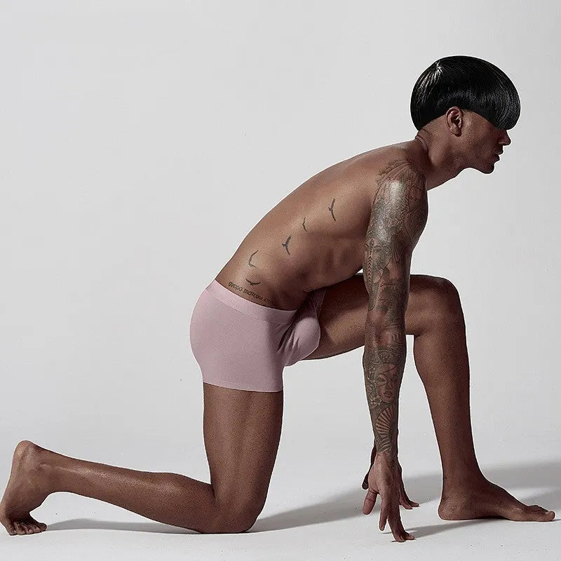 Seamless modal men's underwear in solid colours with mid-waist design for hip lifting and body shaping
