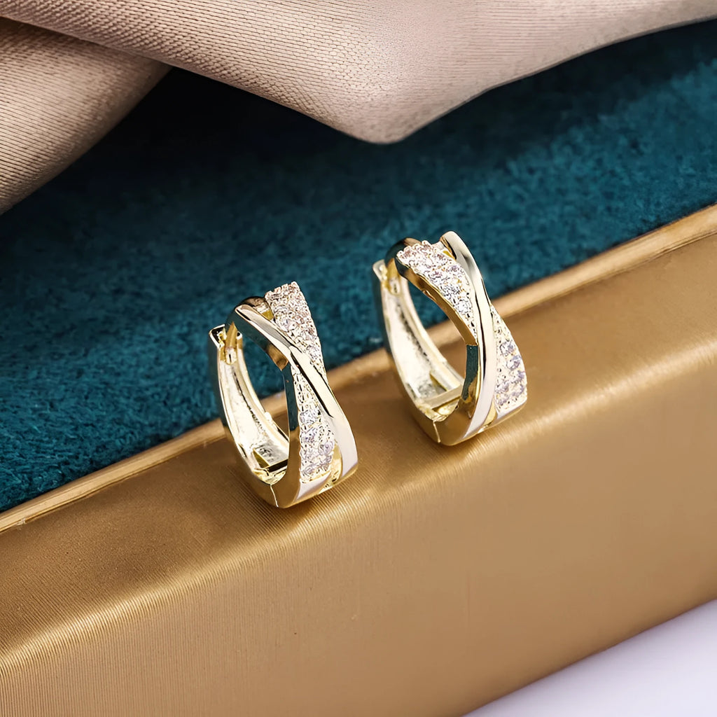 Geometric copper earrings with 14K yellow zircon-treated finish