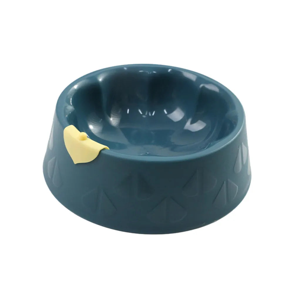 Green plastic double pet bowl feeder for dogs and cats on a white background