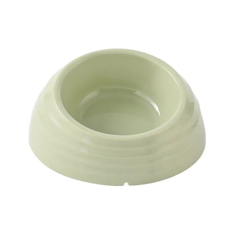 Stainless steel cat bowl in a beige plastic base