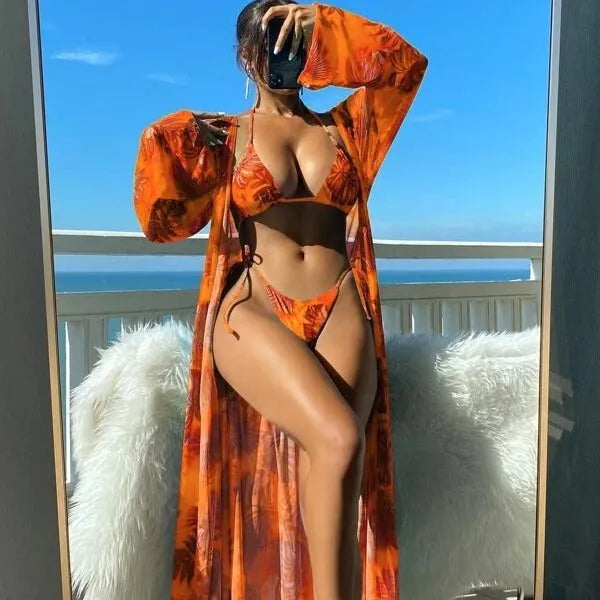 Women's floral print banded bikini set with long sleeve robe cover-up in blue colour