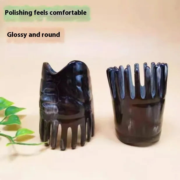 White buffalo horn meridian massage comb showing four different combing surfaces