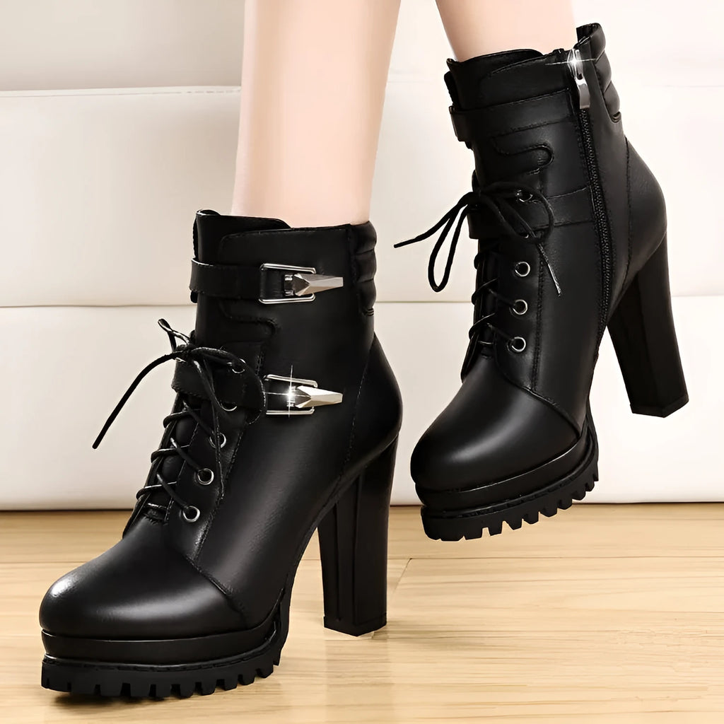 Black round toe thick heel women's high heel shoes with rubber sole on a white background