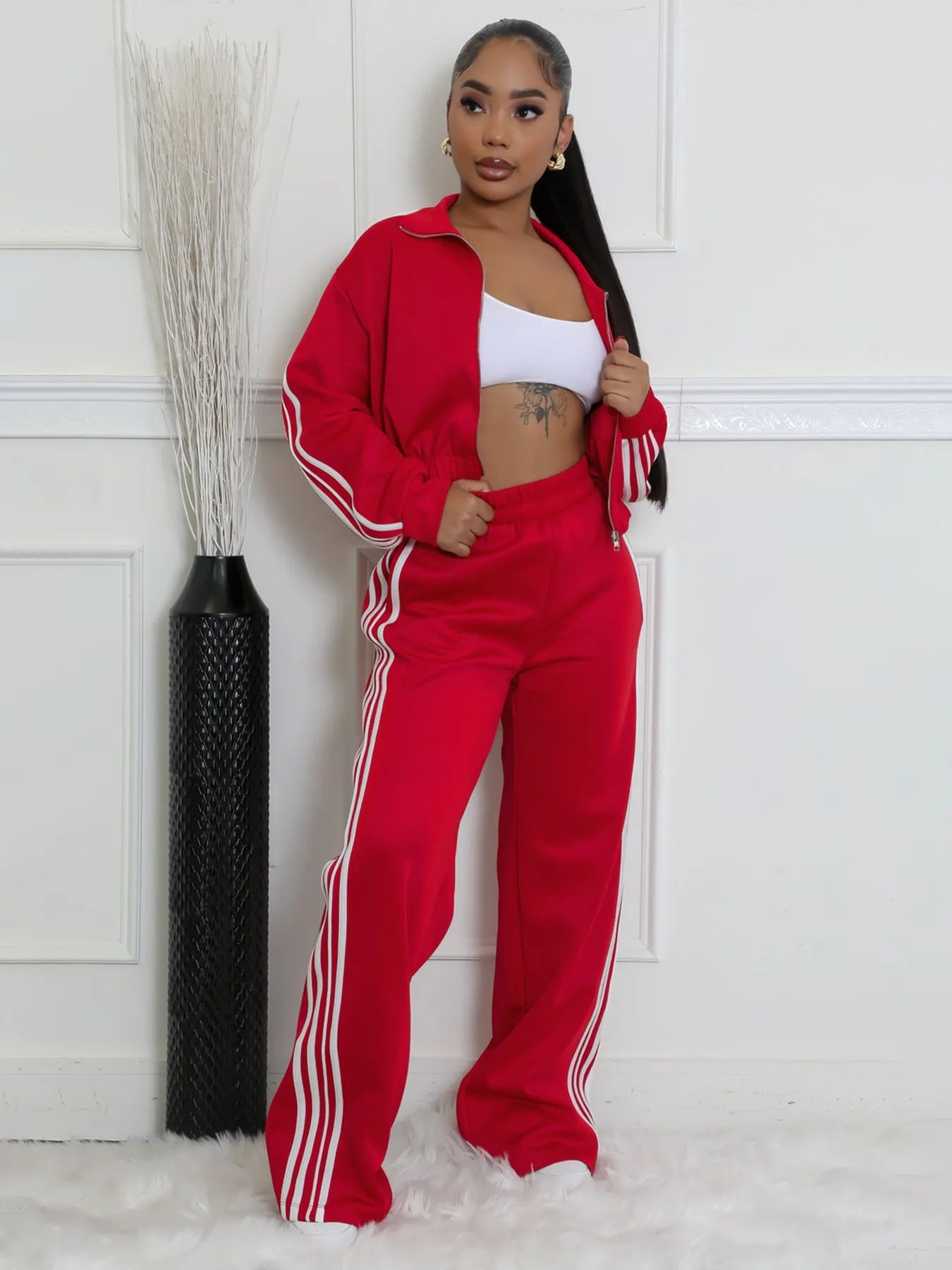 Grey and black striped sweater two-piece set with zipper detail on the top