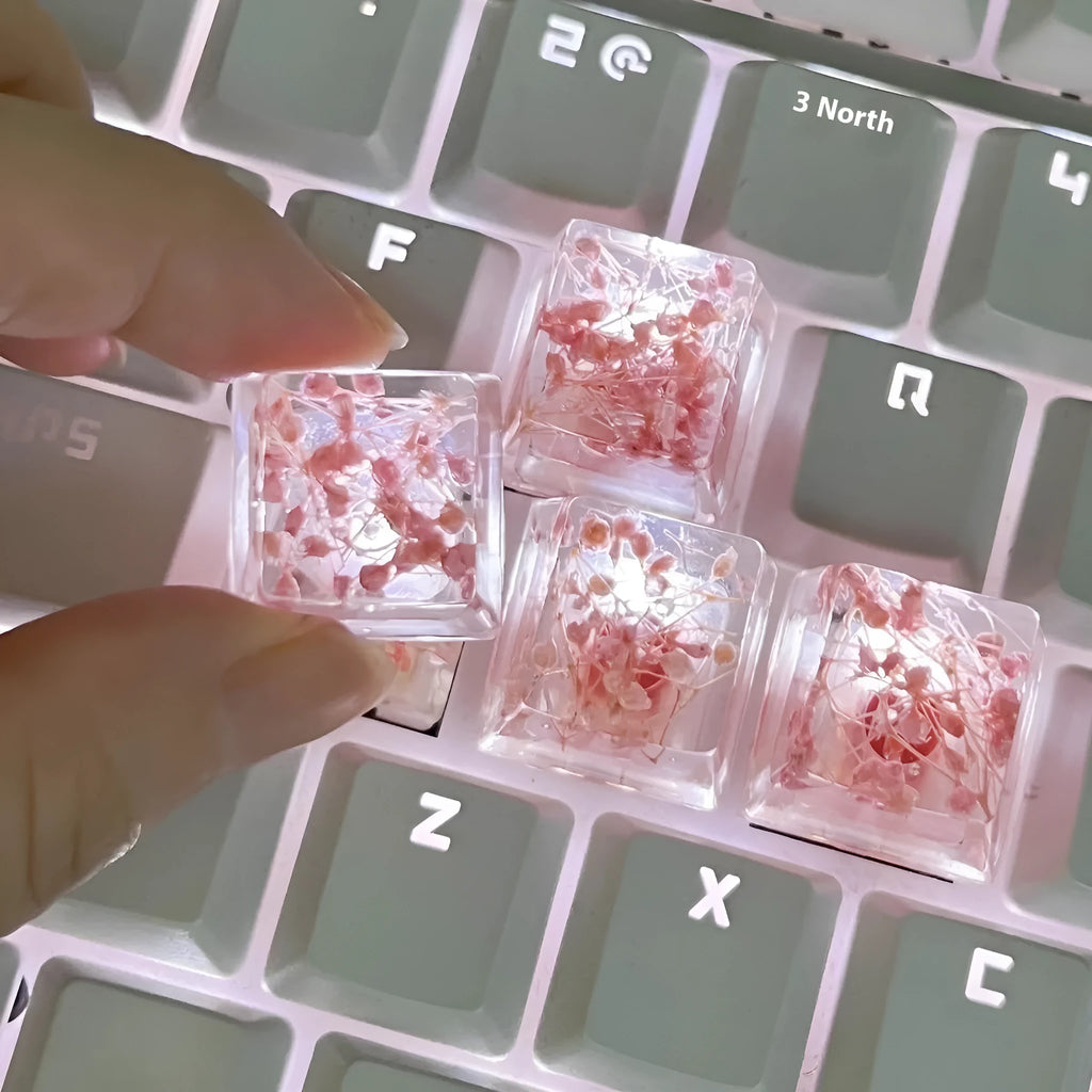 High transparency resin keycap with starry sky design for mechanical keyboards in four colours.