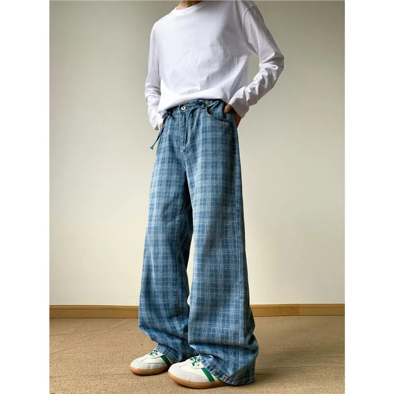 Retro blue plaid wide-leg skinny jeans with mid waist and zip fly, front view, blue denim fabric
