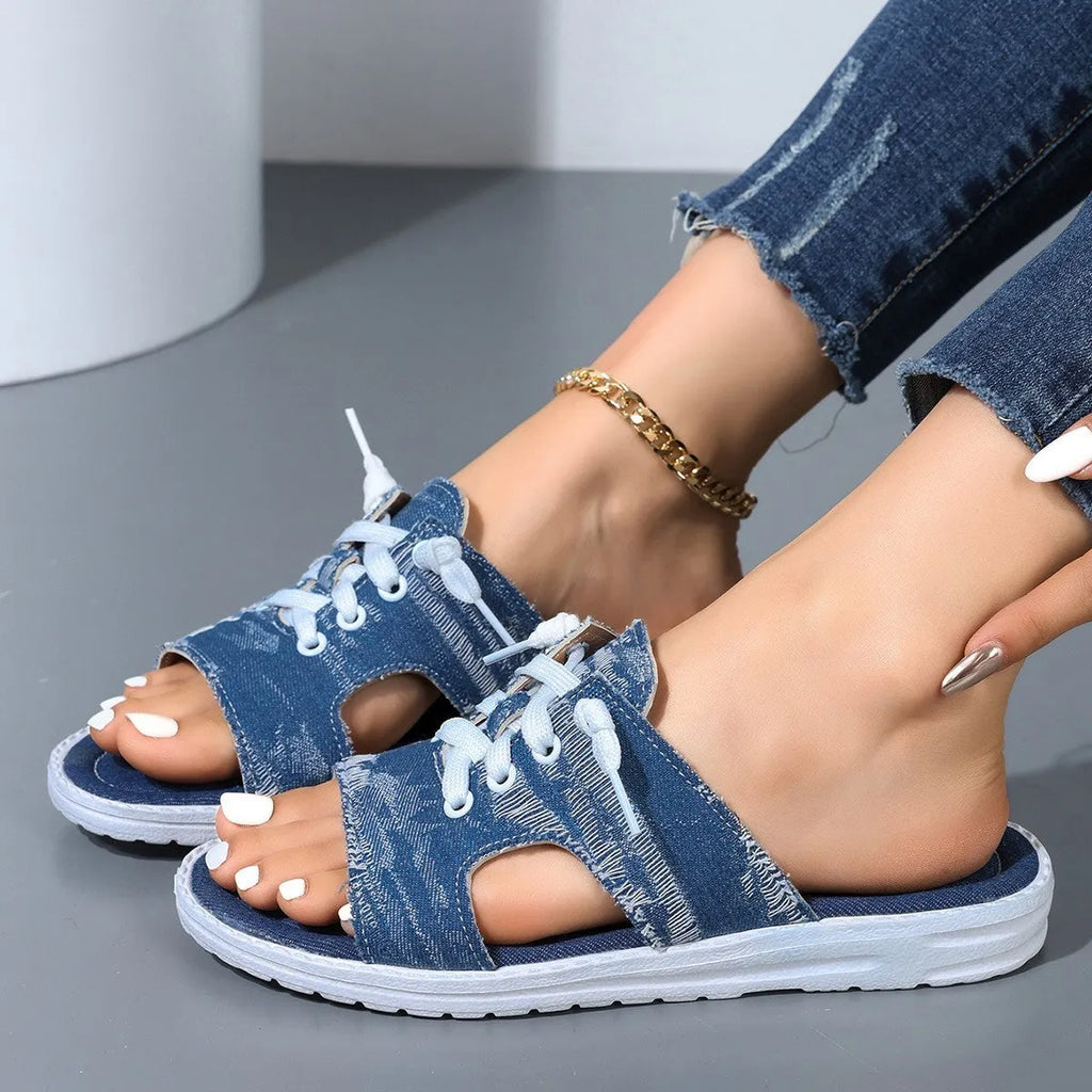 Blue Roman-style women's canvas slippers with cloth lining and rubber sole