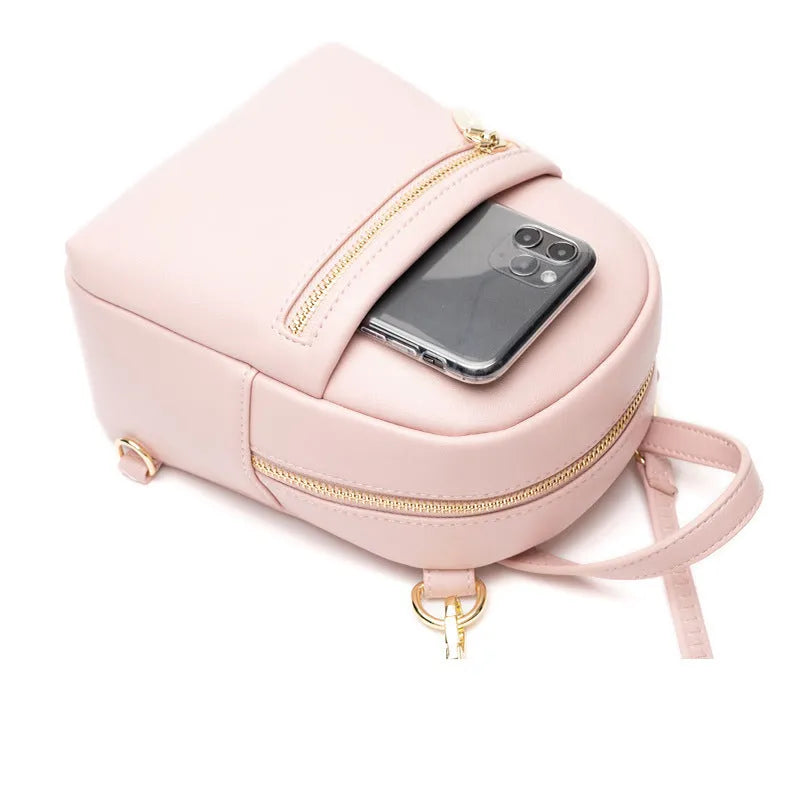 Soft PU mini backpack in street trend style with three-dimensional outer pocket, shown in one of six colour options.