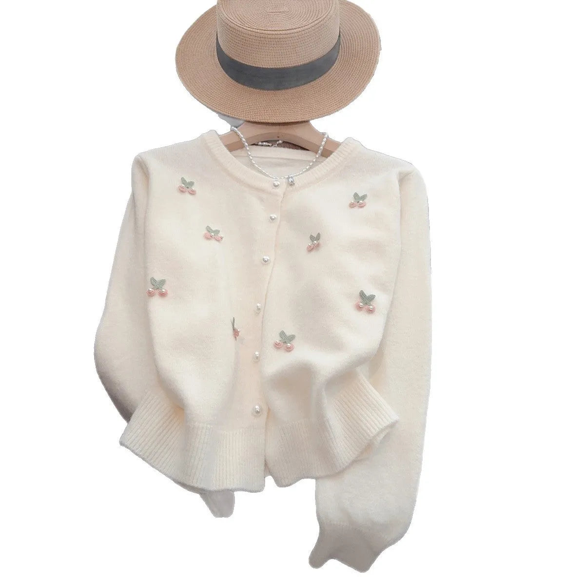 Women's cashmere cardigan with beaded detailing in pink colour showing round neck and slim fit