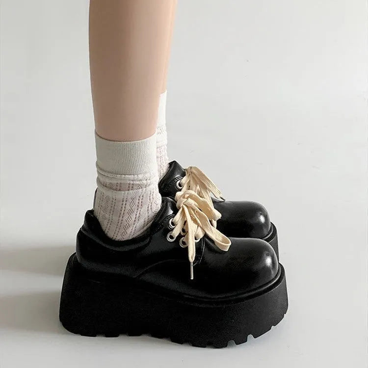Matte black women's retro lace-up shoes with a chunky block heel and round toe.