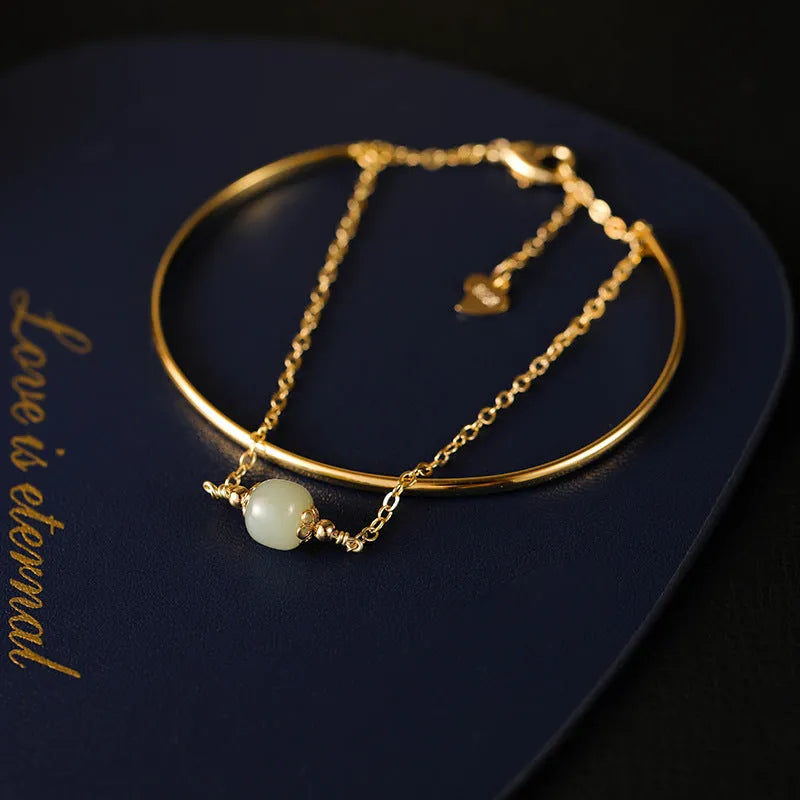 Women's Hetian jade lucky beads bracelet with gold inlay, shown in single, double, and three bead versions.