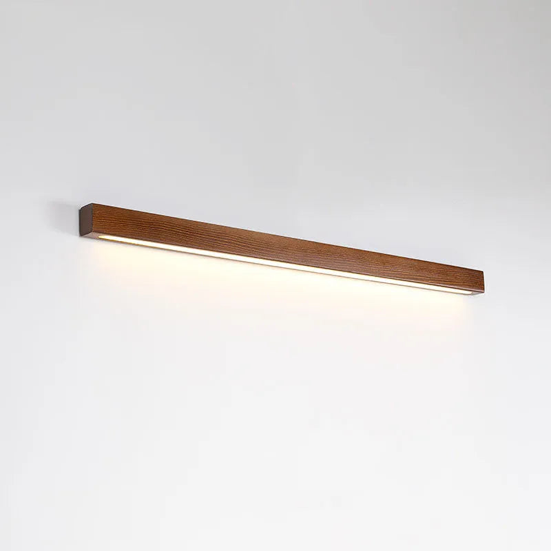 Walnut colour wood and acrylic LED strip wall lamp in modern minimalist design