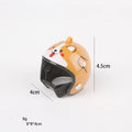 Small adjustable plastic safety helmet for a chicken or bird, shown in a fun design.