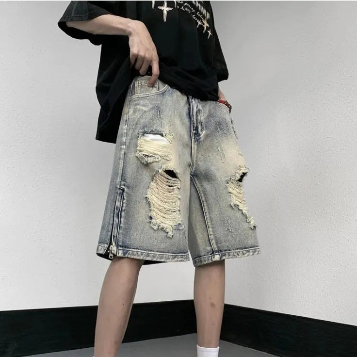 Blue retro denim shorts with wide-leg loose cut and tattered detailing, fifth pants length