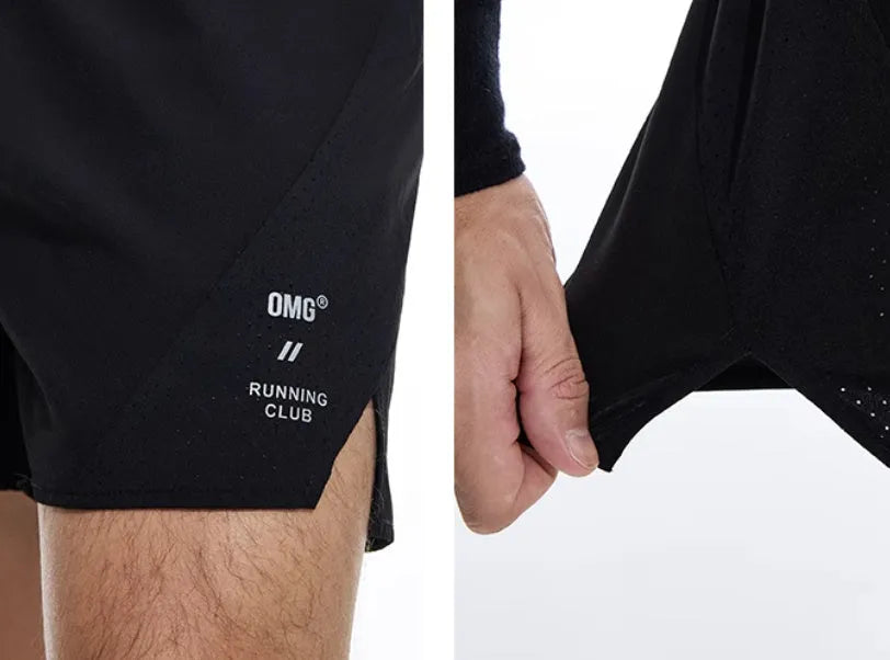 Men's black running shorts with laser stitching on a grey background, showing stretch fabric.