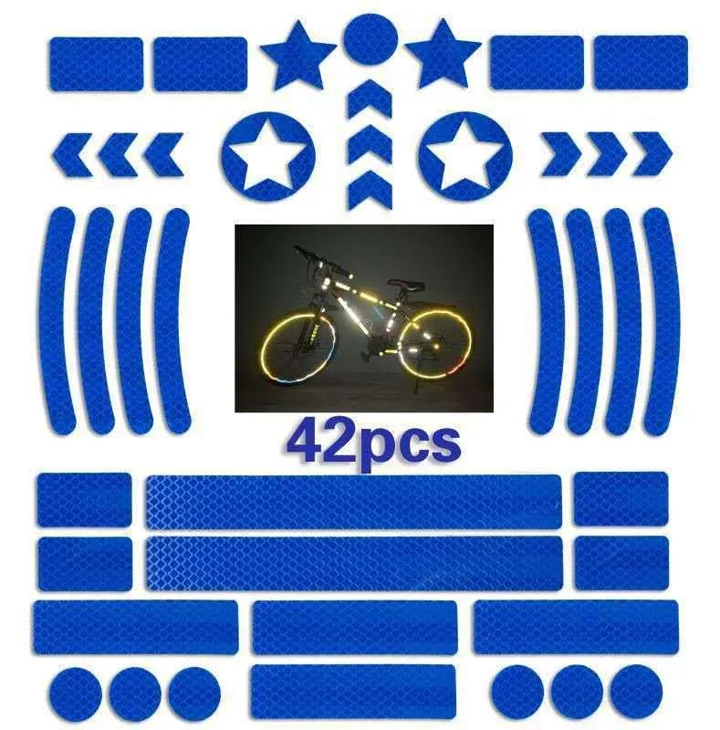 Reflective bicycle safety tape with a geometric grid pattern, shown in red, yellow, blue, and white colours.
