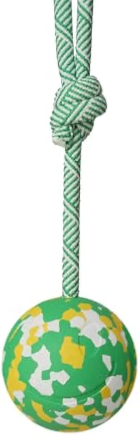 Natural rubber dog ball attached to a nylon rope toy for medium and small breeds