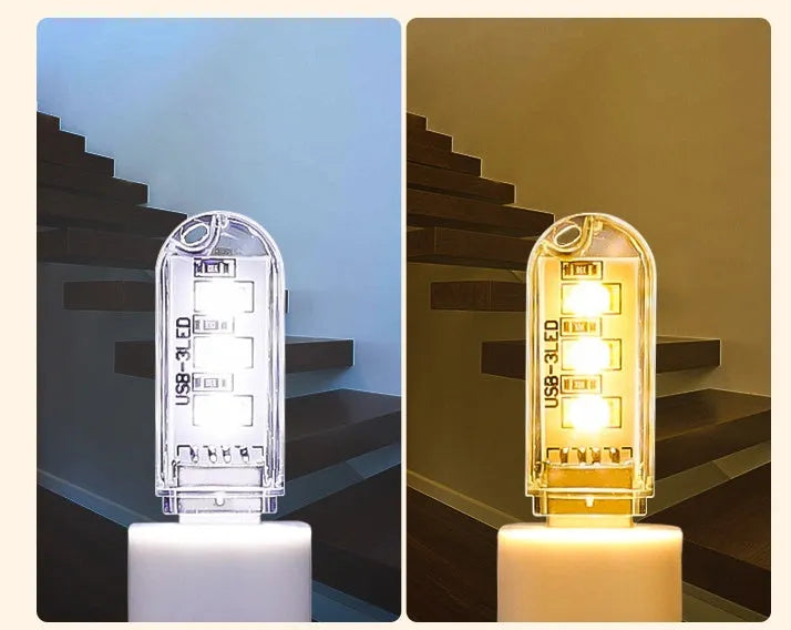 Small white cylindrical USB LED night light showing white and warm light colour options.