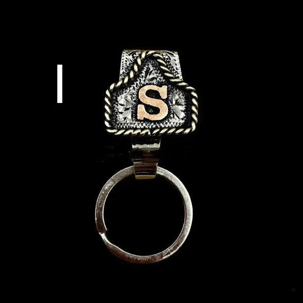 Handmade metal cow tag belt keychain in a selected colour from the A-Z letter range.