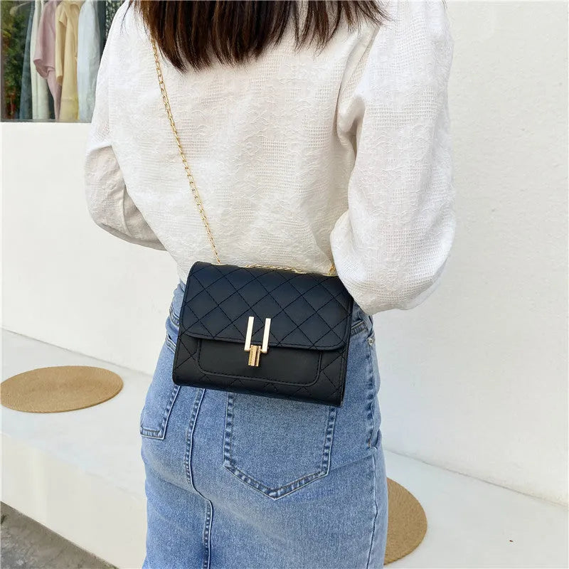Women's crossbody bag with diamond lattice chain strap in black, white or green minimalist design
