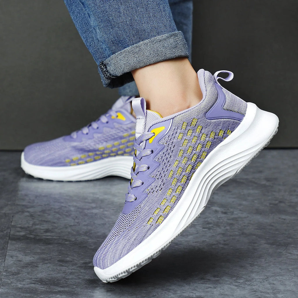 Women's lavender purple Flyknit running shoes with mesh upper and EVA sole for athletic use