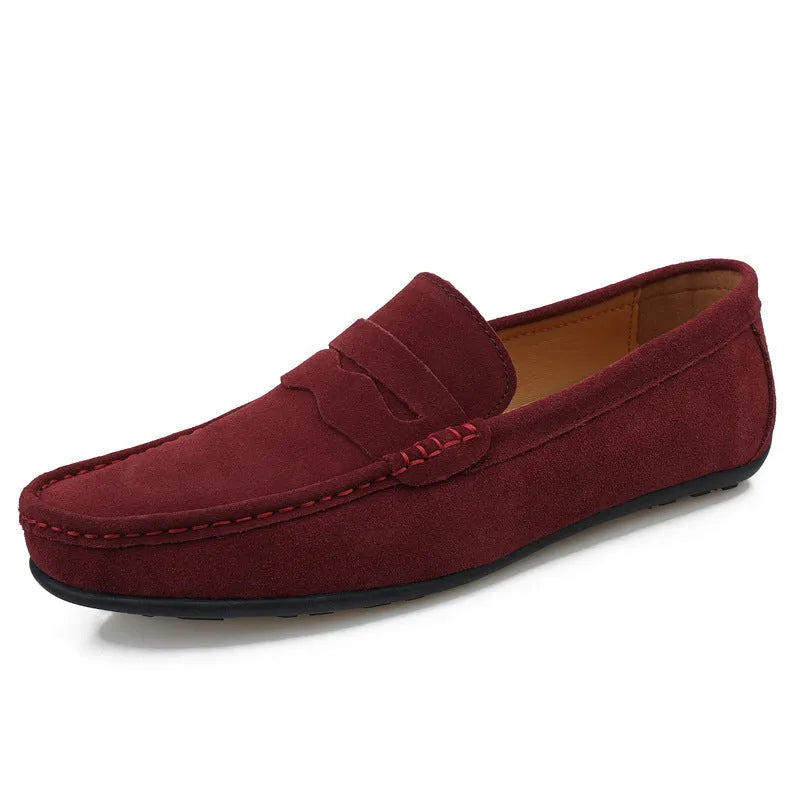 Men's solid colour suede loafers with slip-on design and round toe