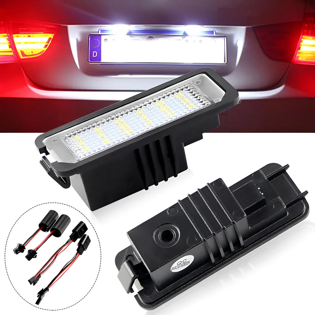 Two Volkswagen LED license plate light units with multiple white SMD LEDs visible.