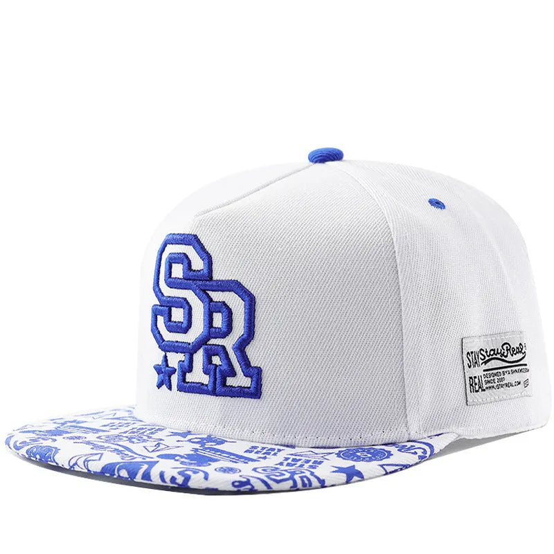 Cotton baseball cap with embroidered letters showing dome crown and adjustable back strap