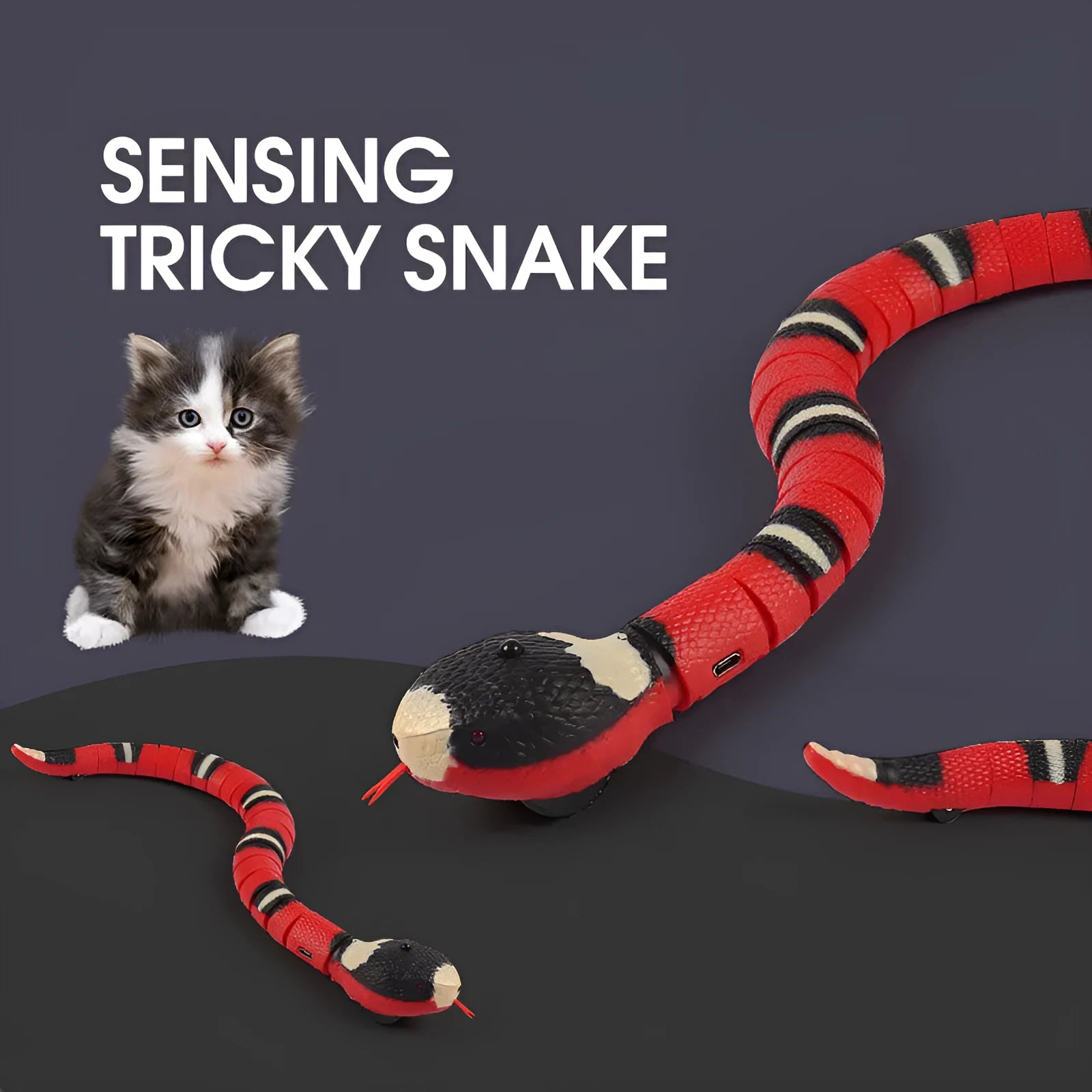 Smart sensing interactive electronic snake cat toy on a floor, showing segmented plastic body and USB charging port.