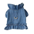 Blue denim dog dress with chest ruffles and a leash hook on the back, shown in dark blue and light blue.