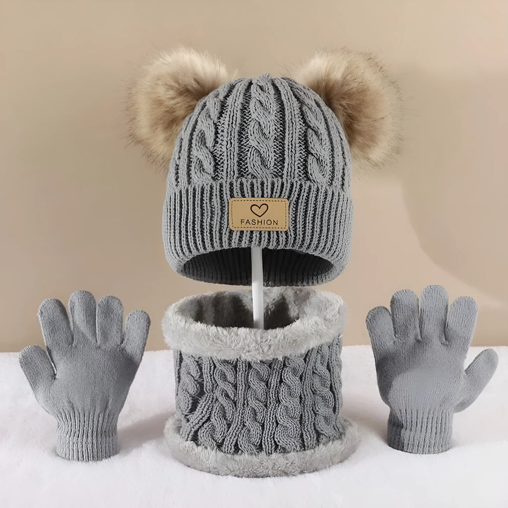 Children's three-piece acrylic knit winter set with dome crown hat and matching scarf and gloves in pink