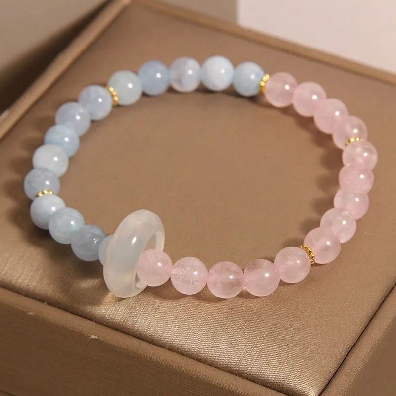 Women's aquamarine crystal bracelet with pink and blue dopamine colours, round geometric beads, handcrafted mixed materials