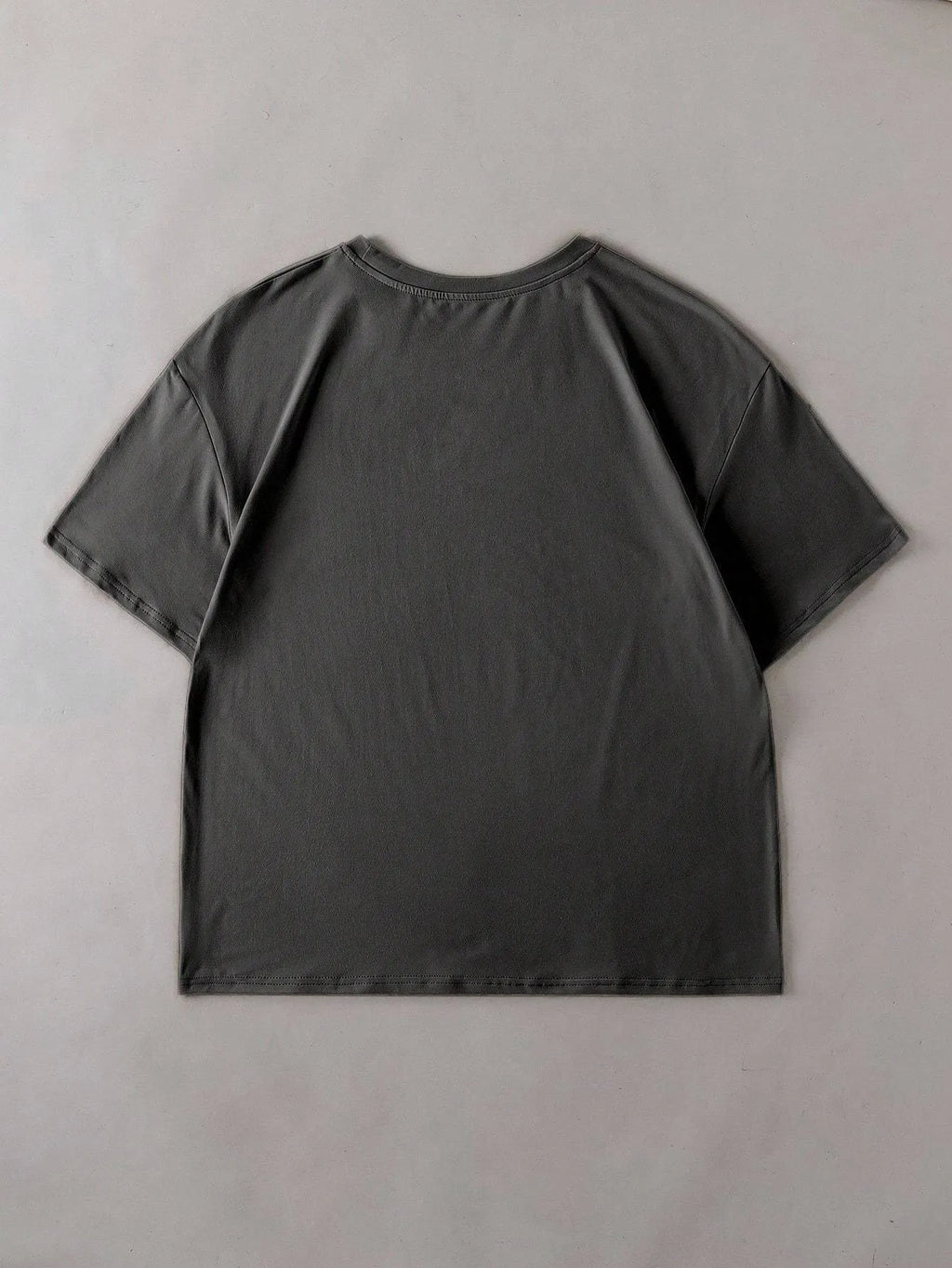 Loose fit cotton short sleeve T-shirt in assorted colours on a hanger