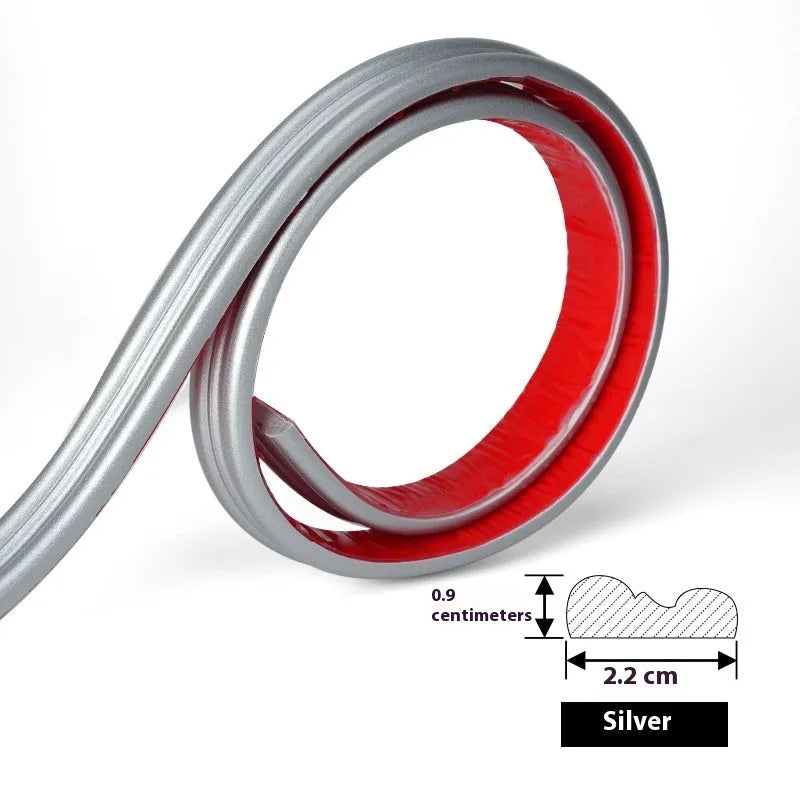 Flexible white PVC self-adhesive wall shaping frame on a blank holder.