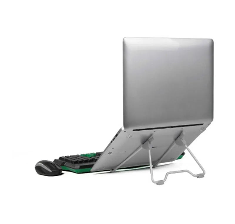 Grey aluminium alloy and plastic mobile phone and laptop stand combo on desk