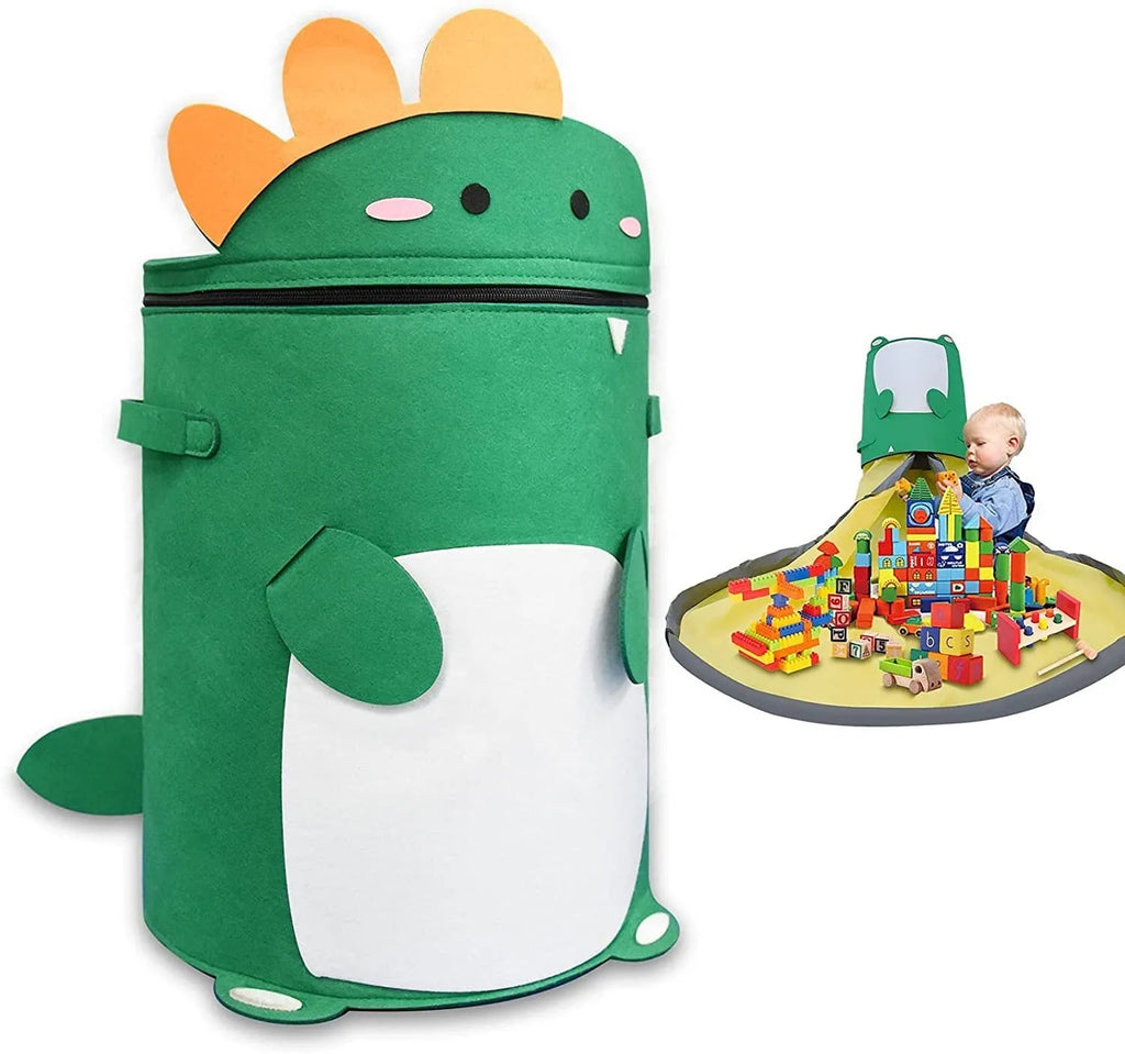 Green felt cube storage bag with pull rope, laid flat as a play mat for toys.