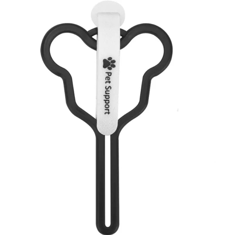 A coloured hands-free dog poop bag holder with a fixed clip and velcro strap attached to a dog leash.