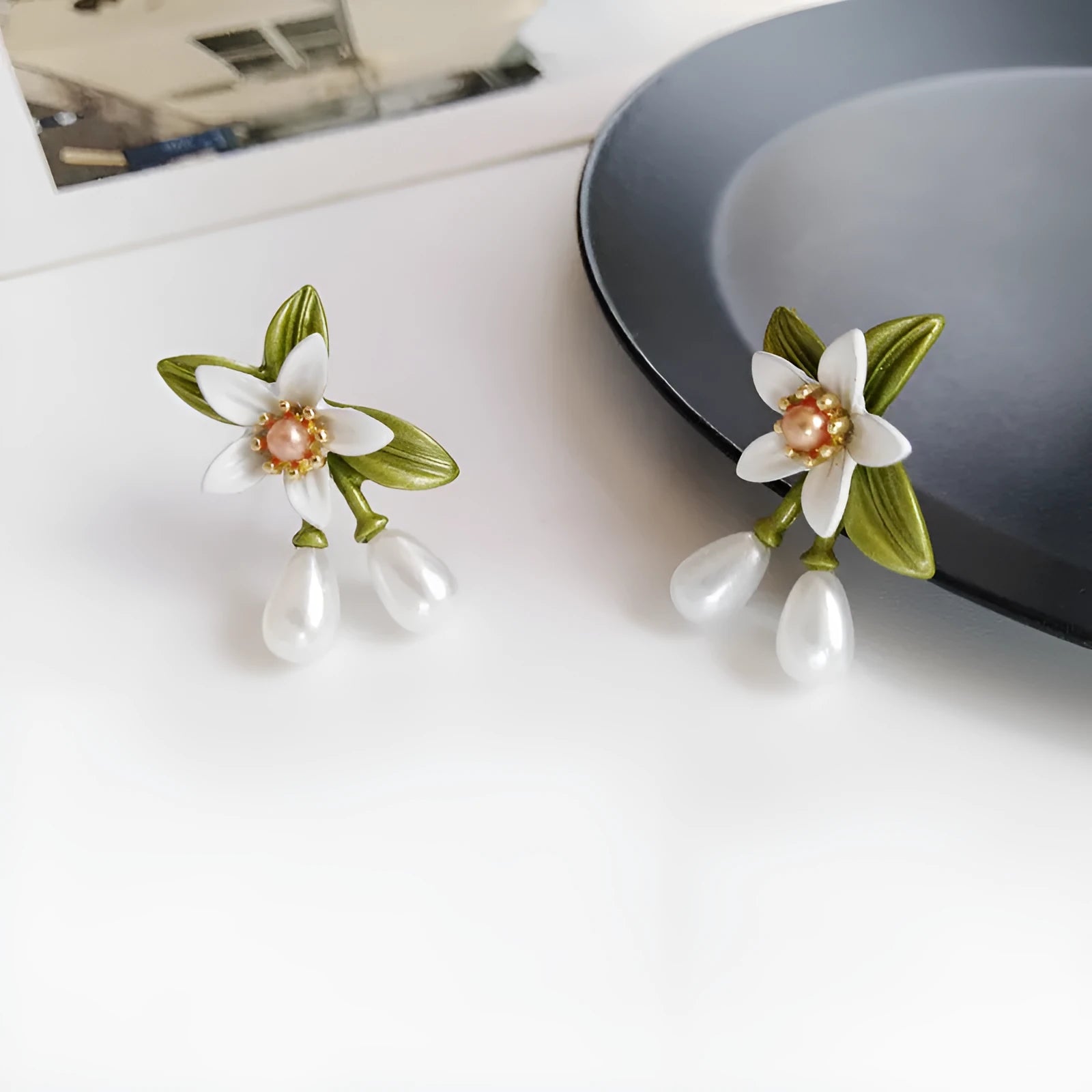 Women's contrast colour floral earrings with sterling silver needle detailing and alloy flower ear clip