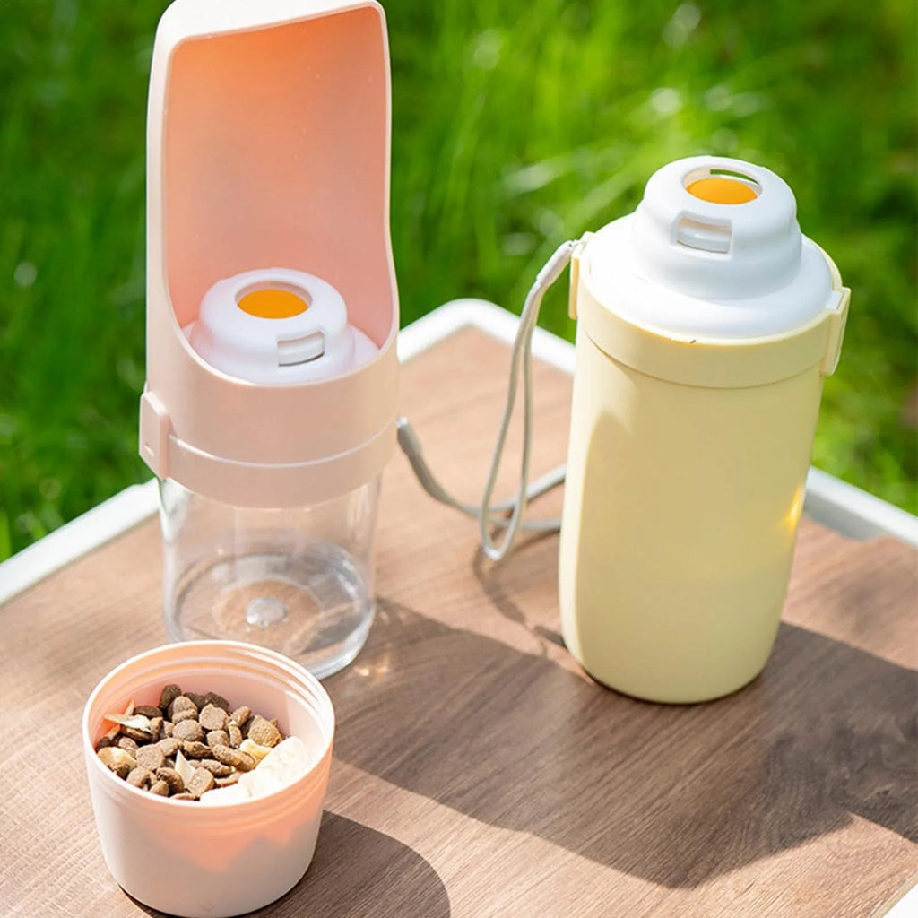 Grey portable 2-in-1 dog water bottle and feeder with drinking cup and lanyard