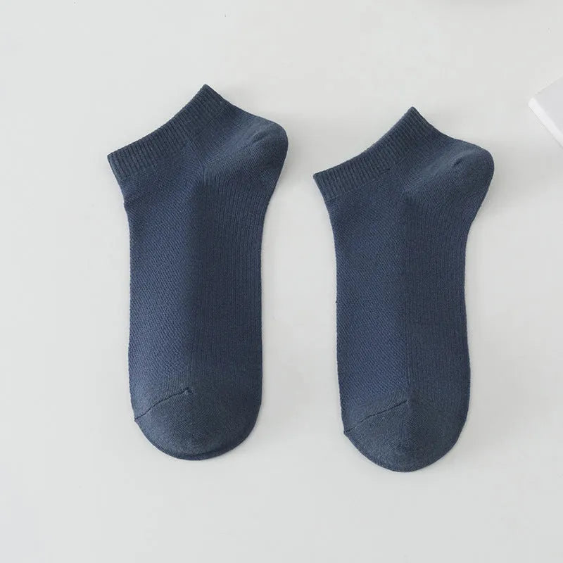 Solid colour low-cut boat socks for men made from polyester, shown in one of six available colours.