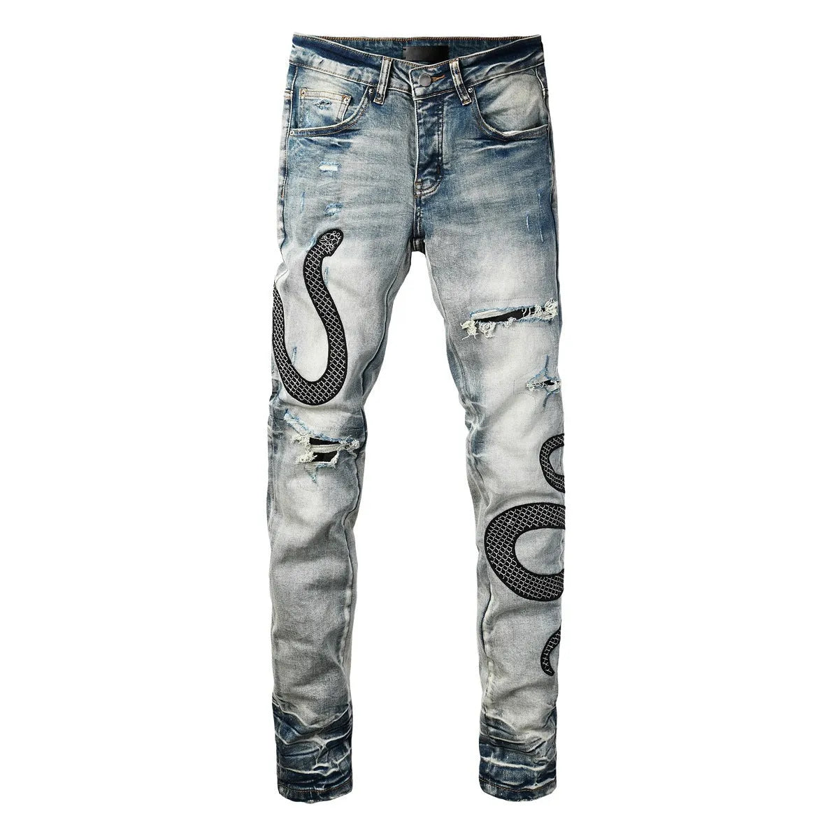 Close-up of wash distressed blue skinny jeans with a button fly and retro styling on a hanger.
