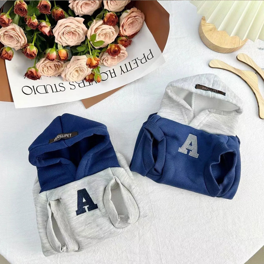 Blue pet hoodie with reflective grey-white lettering, slim-fitting design for cats and dogs