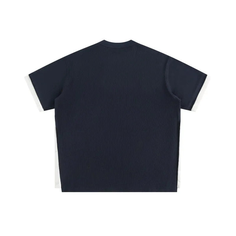 Retro alphabet embroidered loose waffle t-shirt in navy blue, short sleeve pullover style.