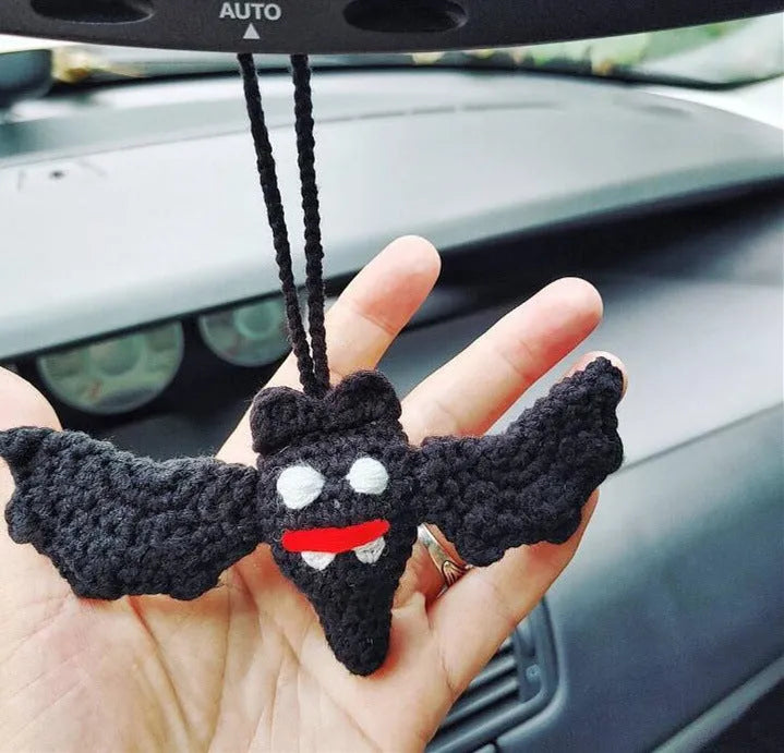 Plush hand-woven polyester automobile hanging ornament with cartoon style design on car dashboard