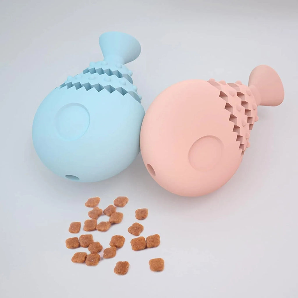 Blue fish bone shaped dog chew toy with hollow centre for treats, shown next to a green and pink version.