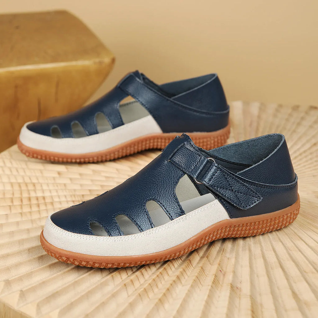 Women's plus size flat heel sandals with hollow toe cap in blue, red, or white on a thick rubber sole.