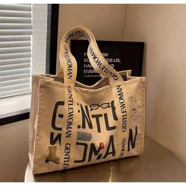 Large capacity cotton canvas tote bag with printed design options including black letter, coloured letter and pattern styles