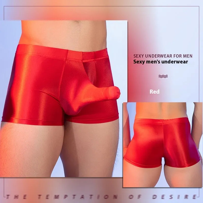 Men's red boxer shorts with an elephant nose print, made from seamless nylon fabric.