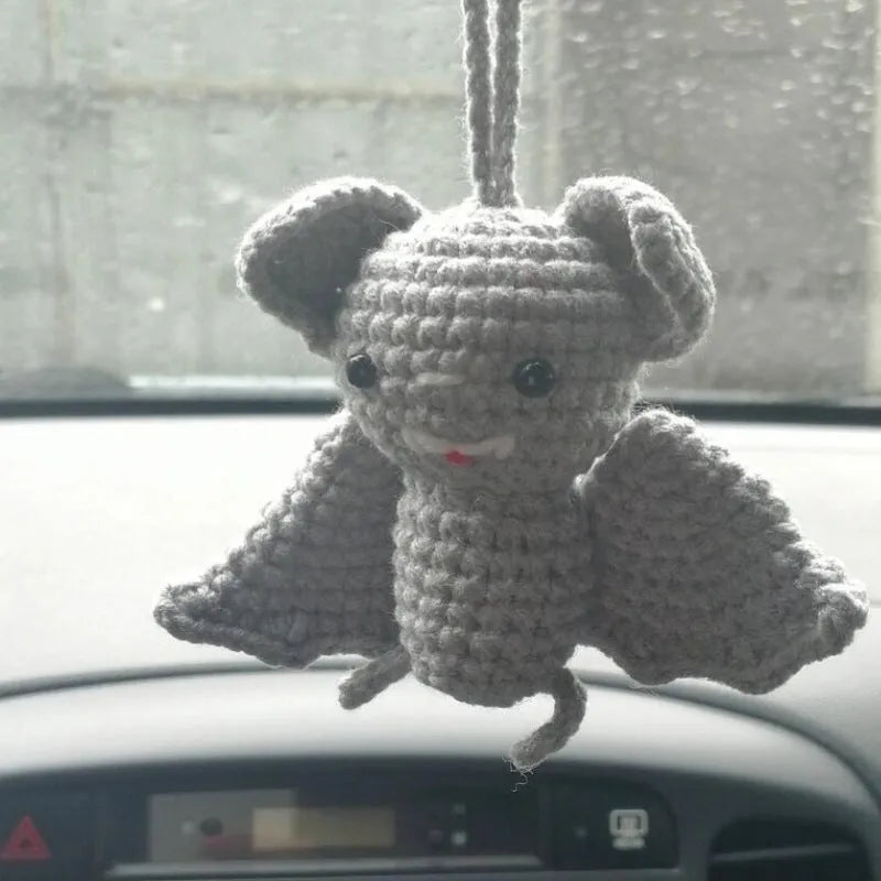 Plush hand-woven polyester automobile hanging ornament with cartoon style design on car dashboard